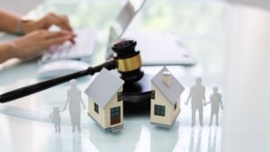 a paper house split in two